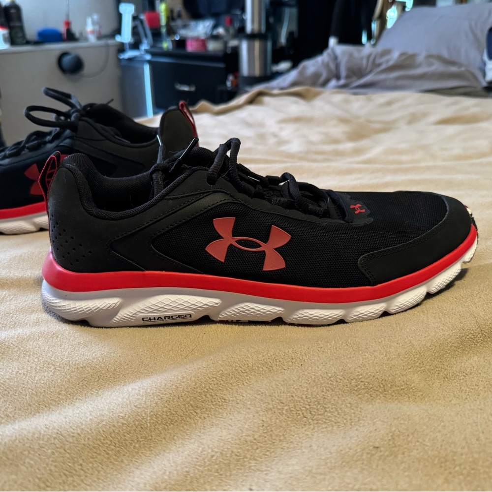 Under Armour Shoes. Black with Red Trim. Never been worn. NWOT